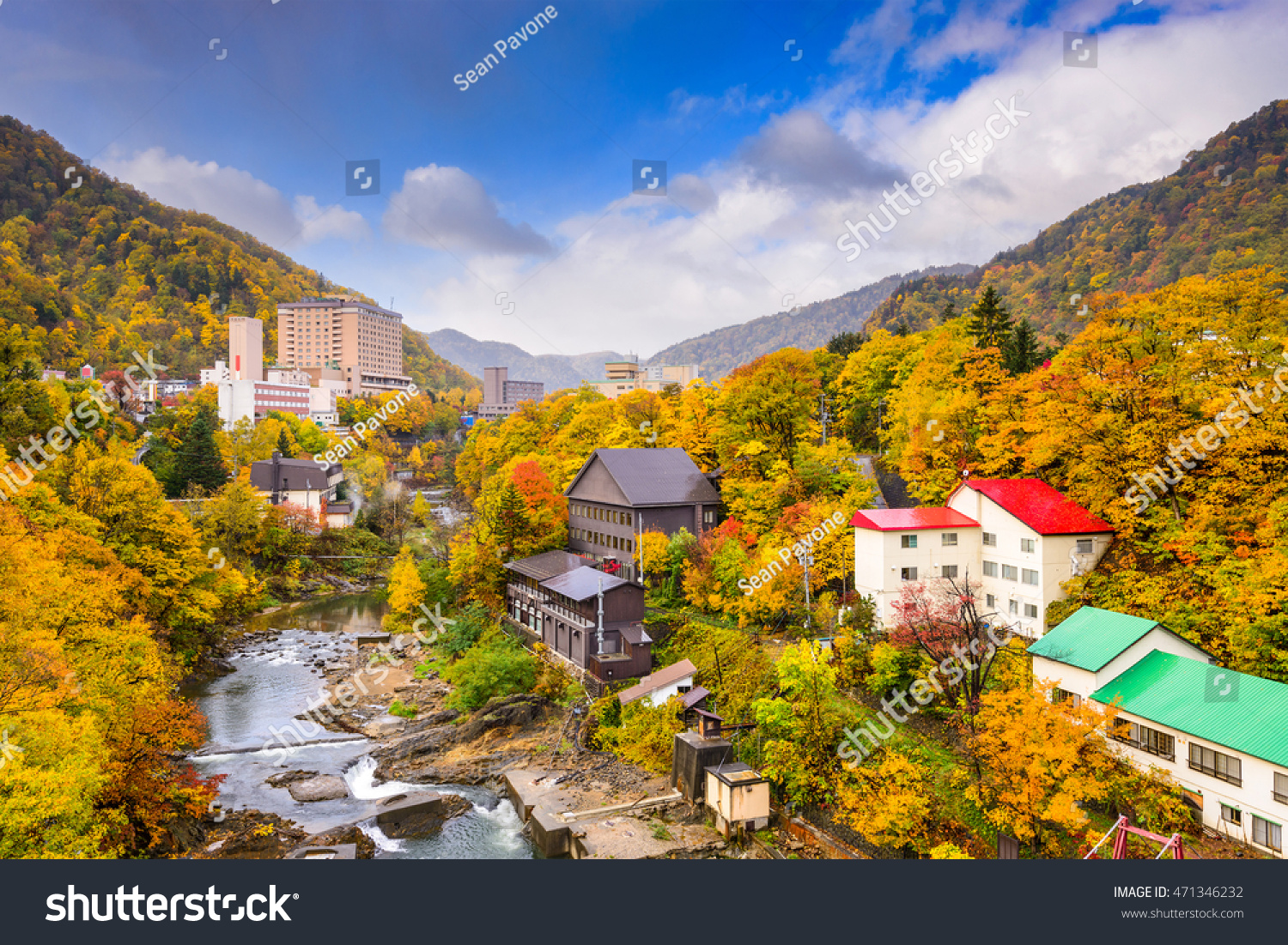Jozankei  Japan inns and river skyline during the autumn season.