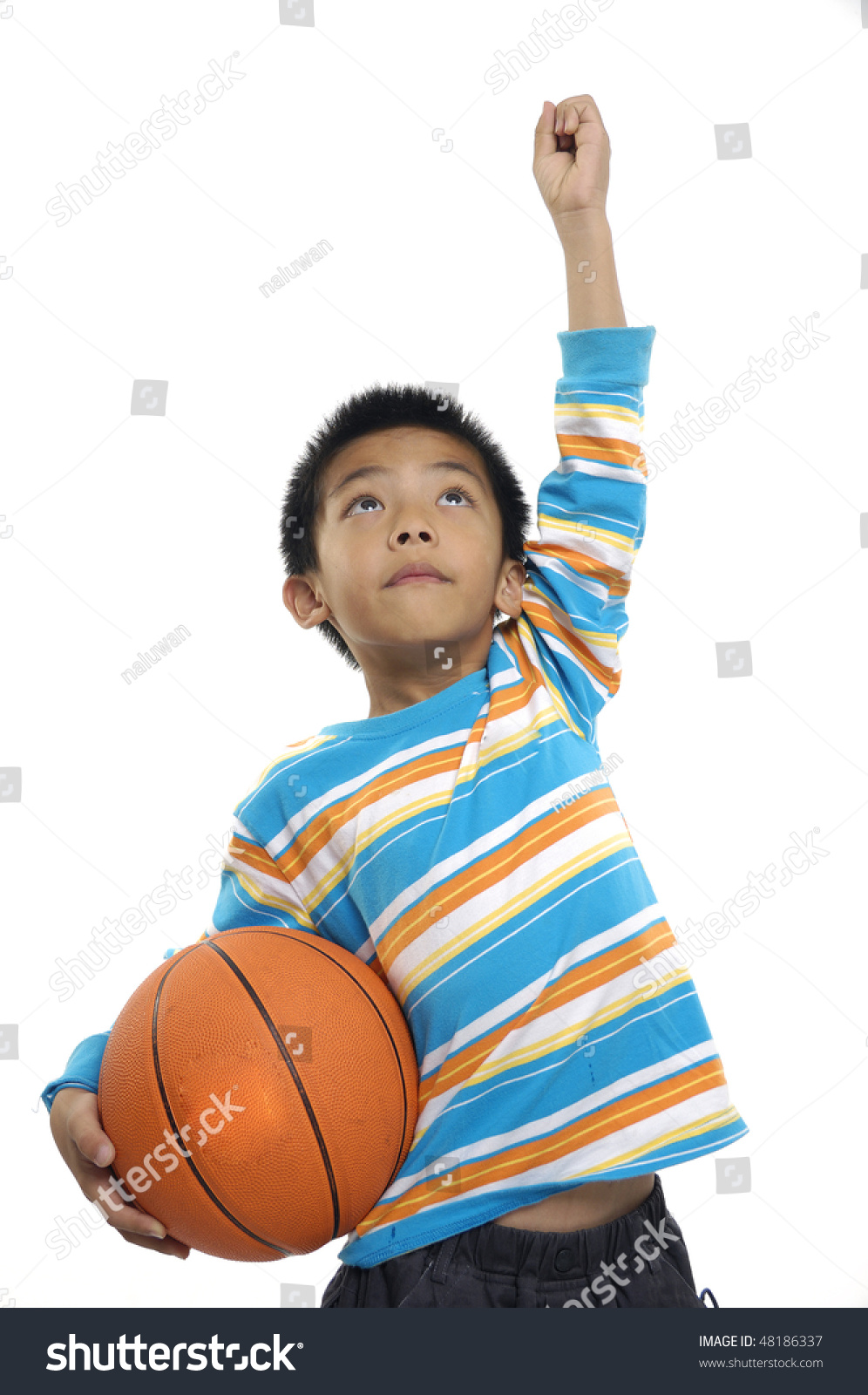 Young boy holding a Basketball