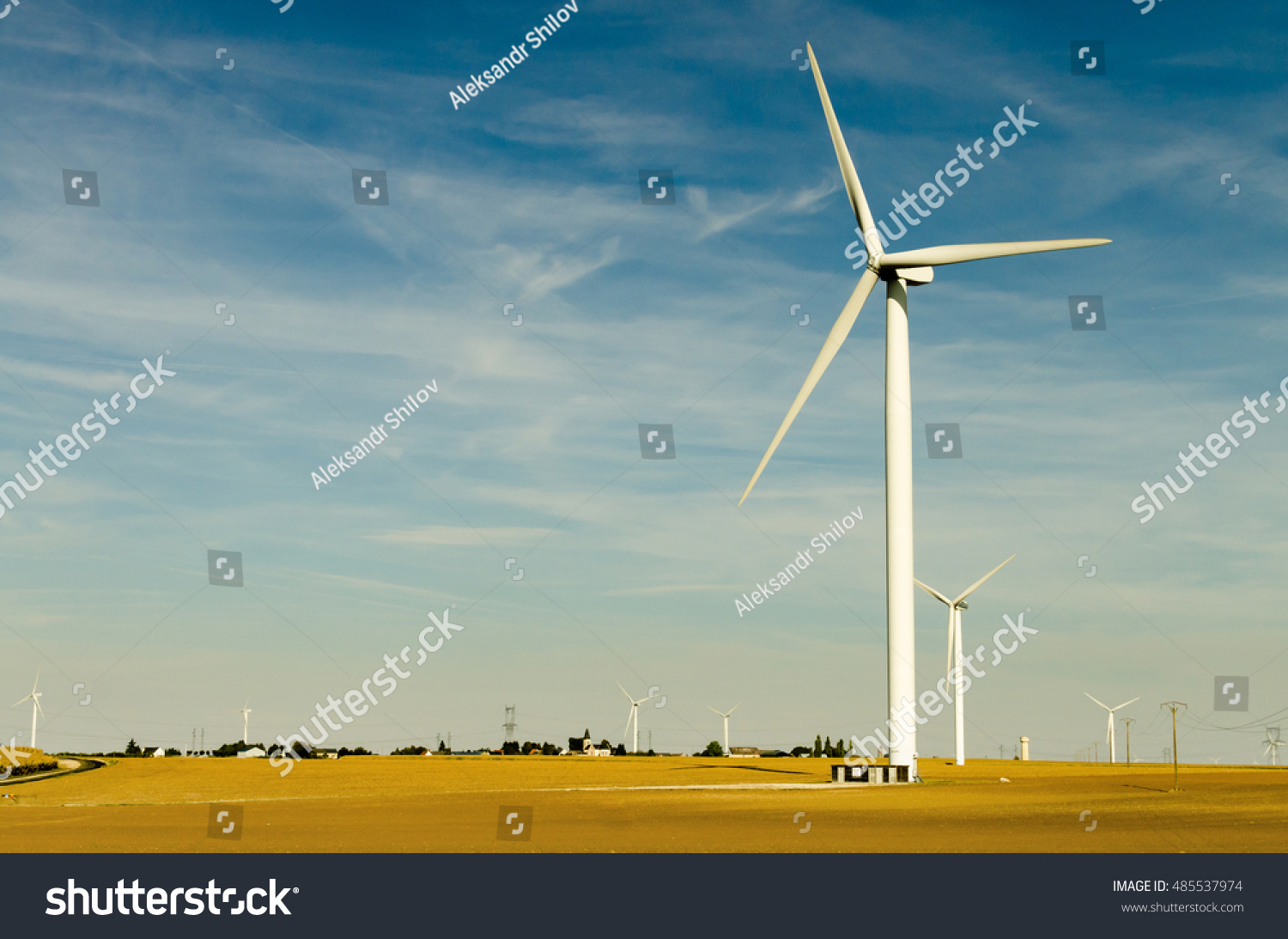 Wind farm in the autumn in France. The ecological way of energy production.
wind turbines