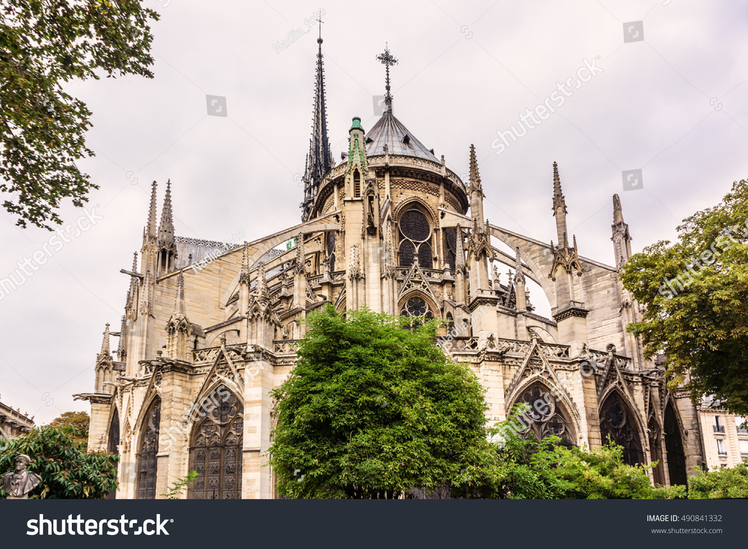 The Cathedral of Notre Dame de Paris - famous Gothic  Roman Catholic cathedral. Sunset. France.