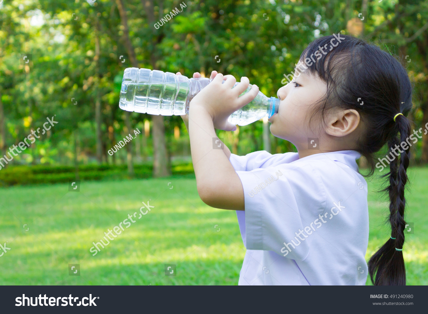 Child drinking water.