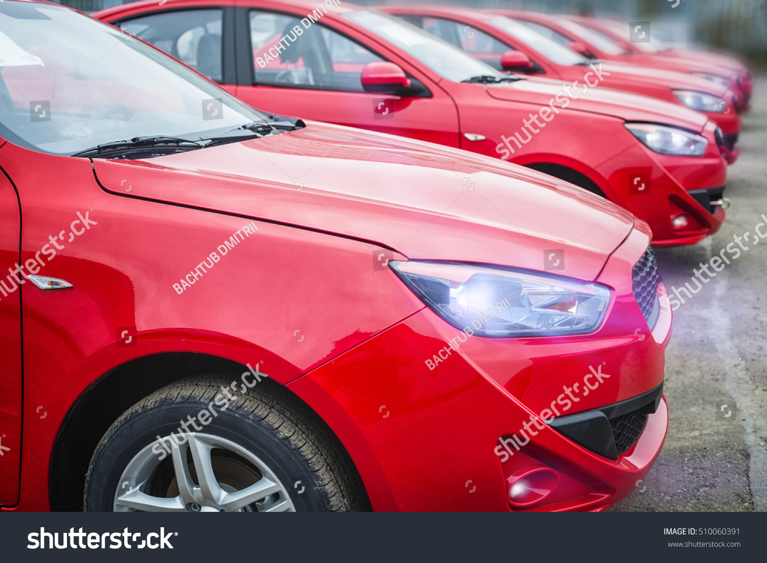many red car with a small depth of field