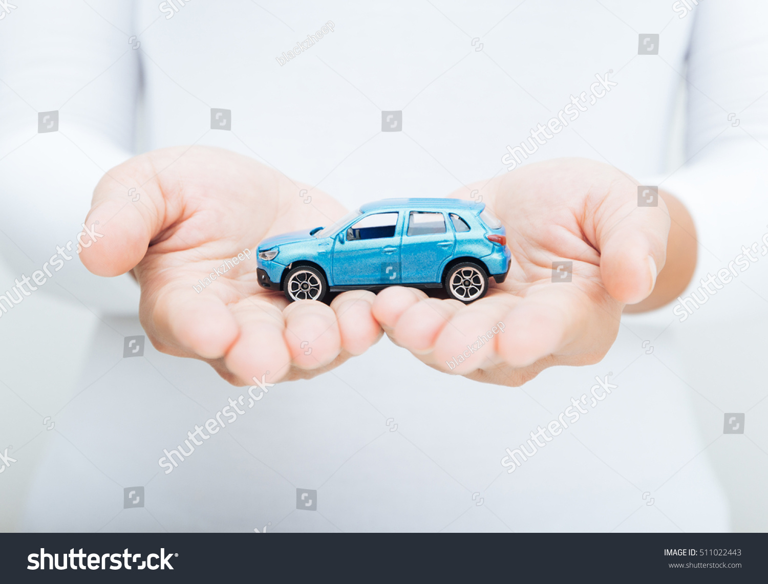 woman hand holding car business concept