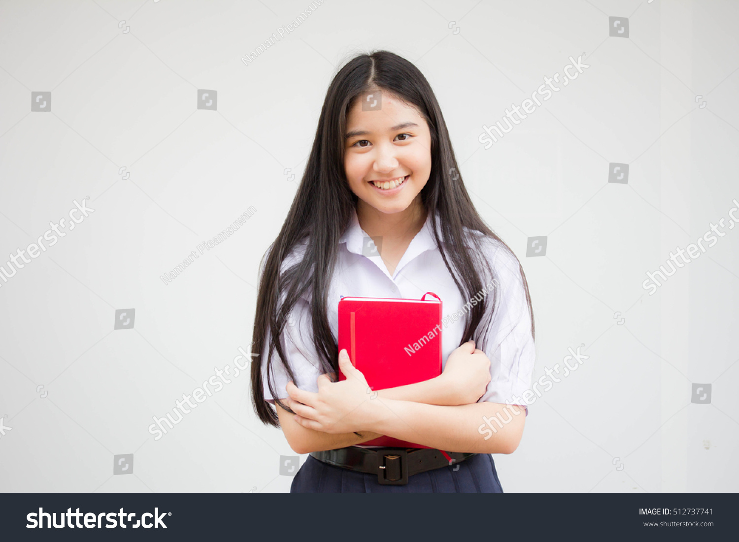 asia thai high school student uniform beautiful girl read a book
