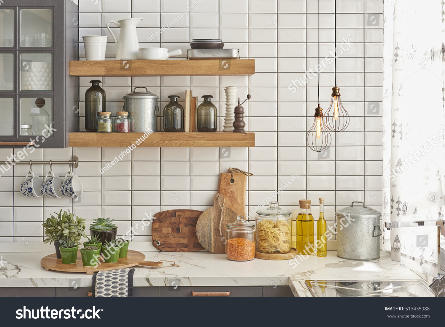 white tiles wall modern kitchen with chopping board  modern lamp