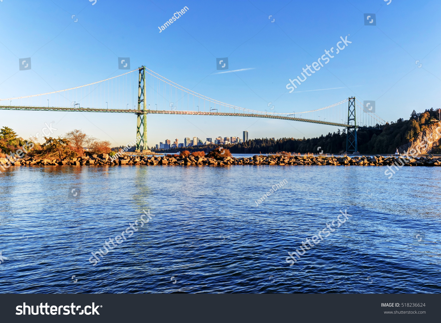 Lions gate bridge from West Vancouver Canada - with Vancouver city center in the background and a jetty in the foreground