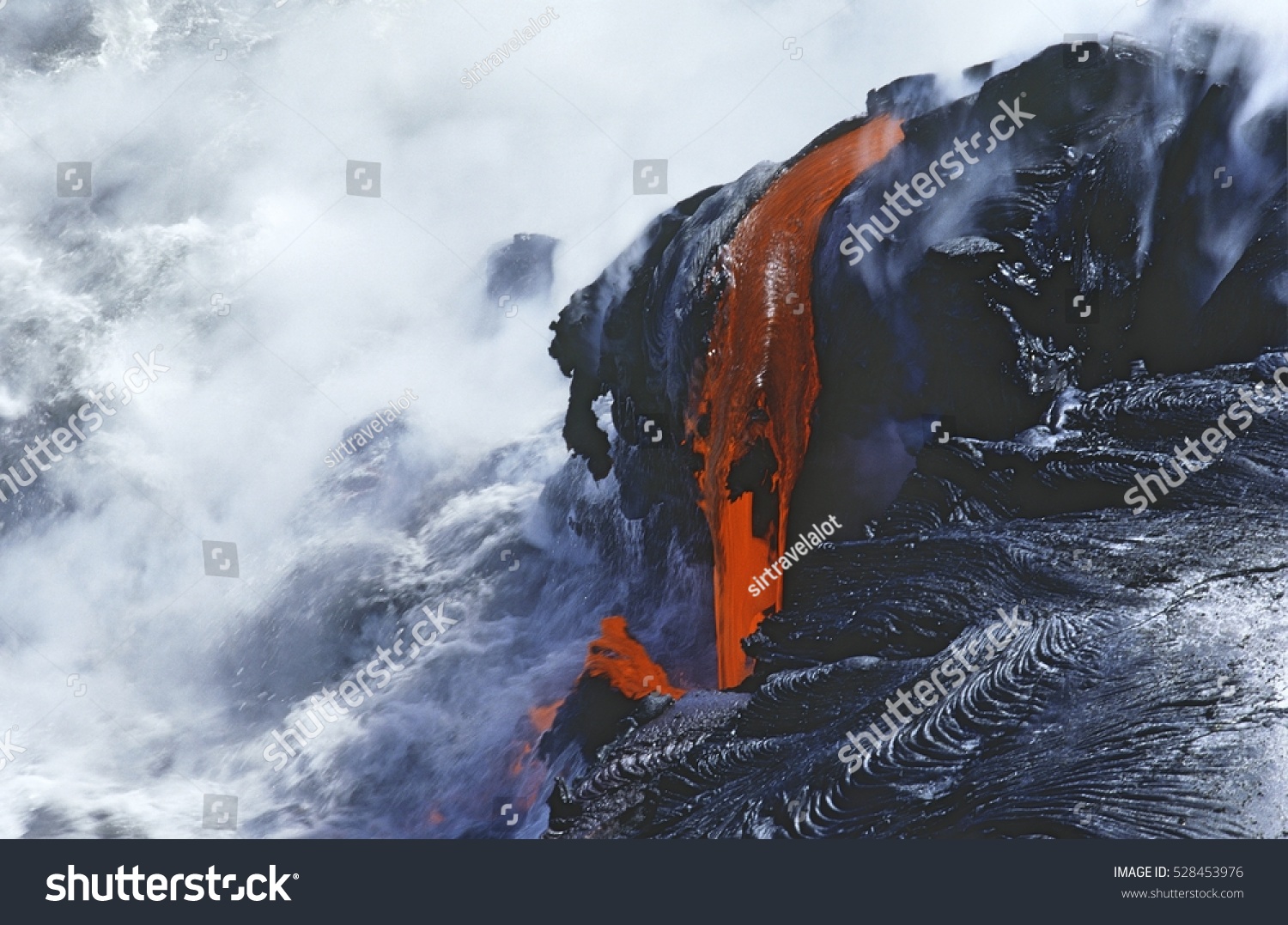 USA  Hawaii  Big Island  Volcanos National Park  cooling lava and surf