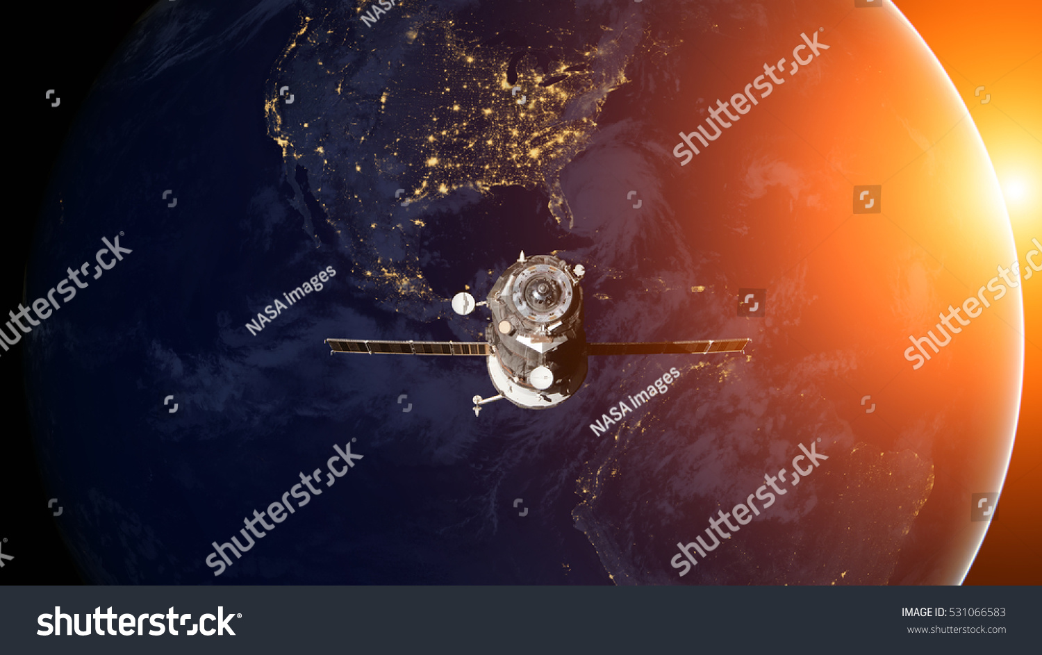 Spacecraft Progress orbiting the earth. Elements of this image furnished by NASA.