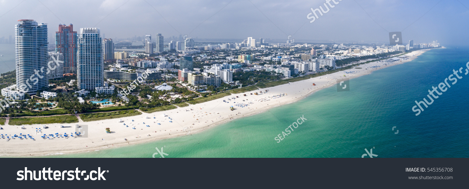 Miami South Beach Aerial Panorama Tourist Destination Sunny Day Hotels and Green Ocean Water