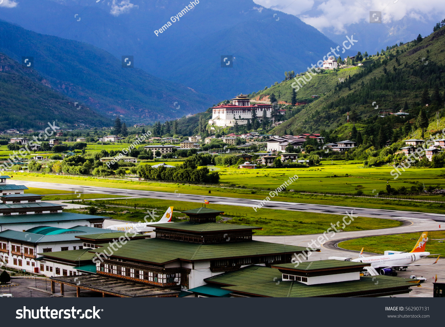 Paro Rinpung Dzong with Paro International Airport in the foreground