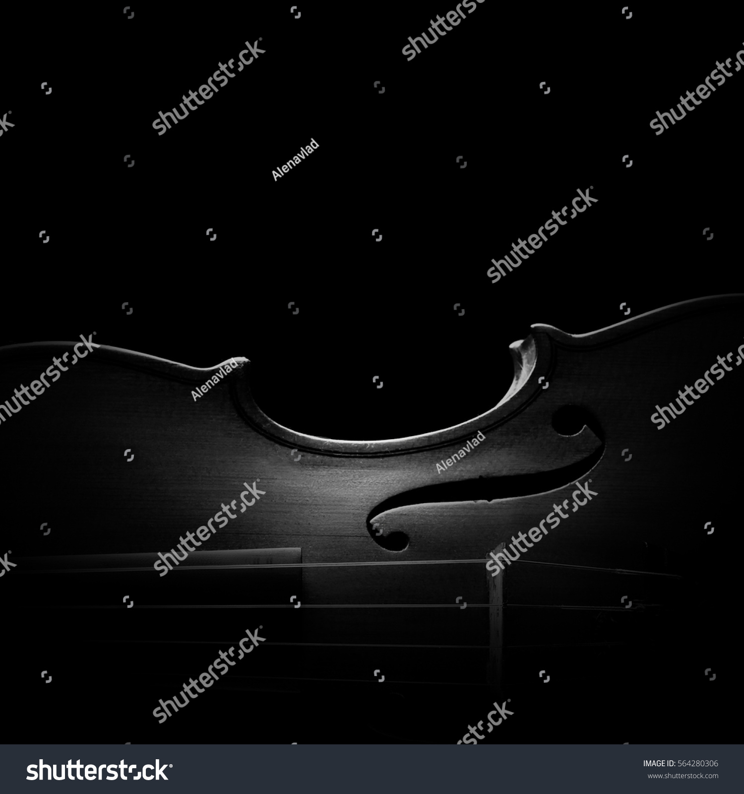 Violin orchestra musical instruments close up isolated on black. Music background with violin
