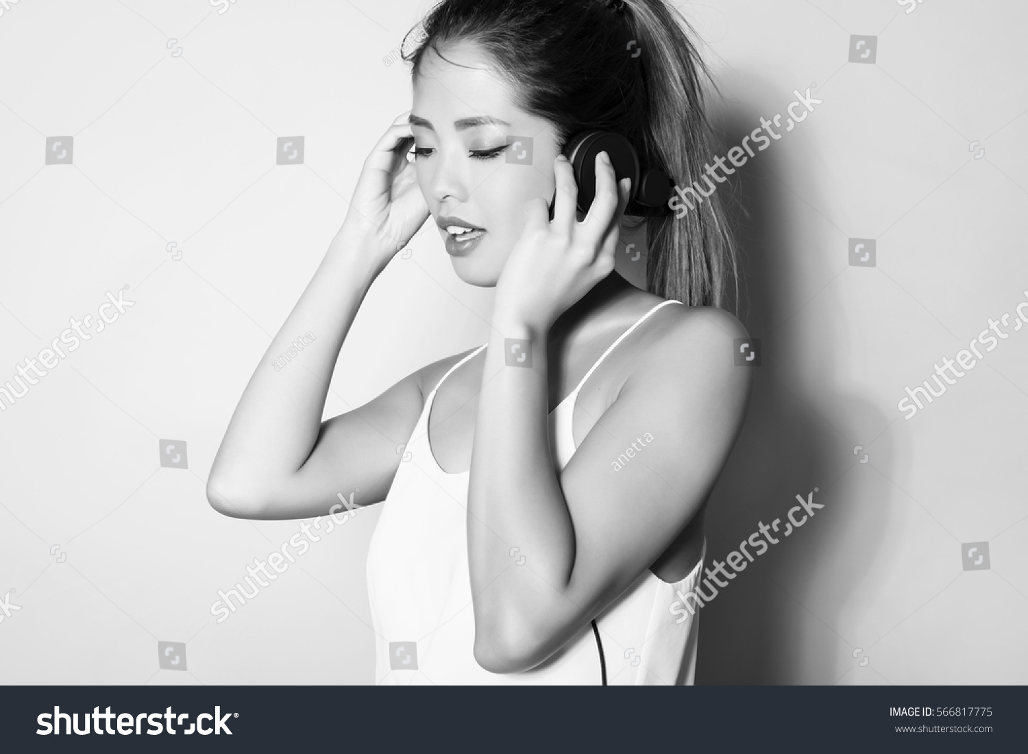 Beautiful asian woman with headphones