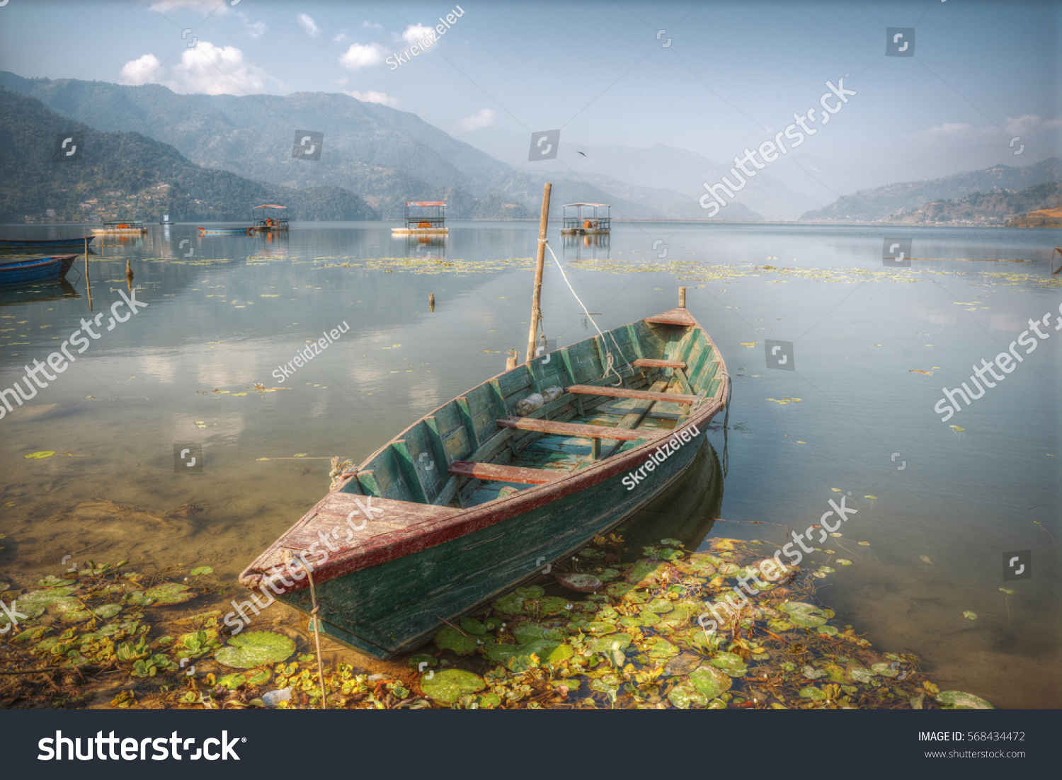 Phewa Lake - the second largest lake in Nepal located in the Pokhara Valley near the town and the mountain Sarangkot.