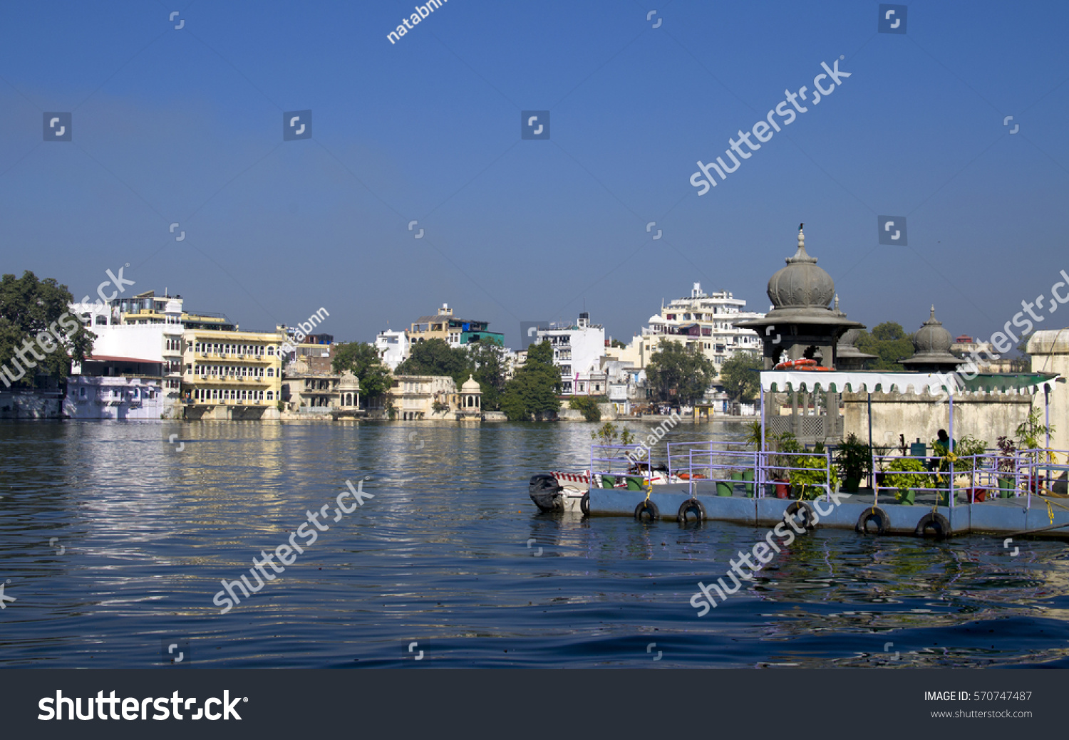 beautiful landscape of the city of Udaipur and the lake Pichola in India