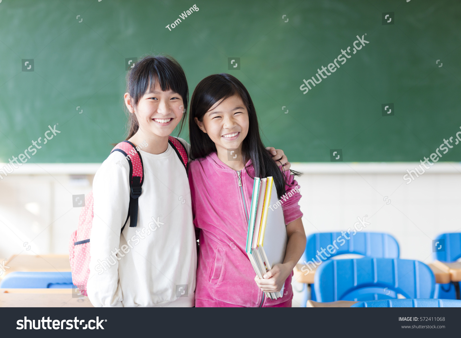 Two teenage girls student in the classroom