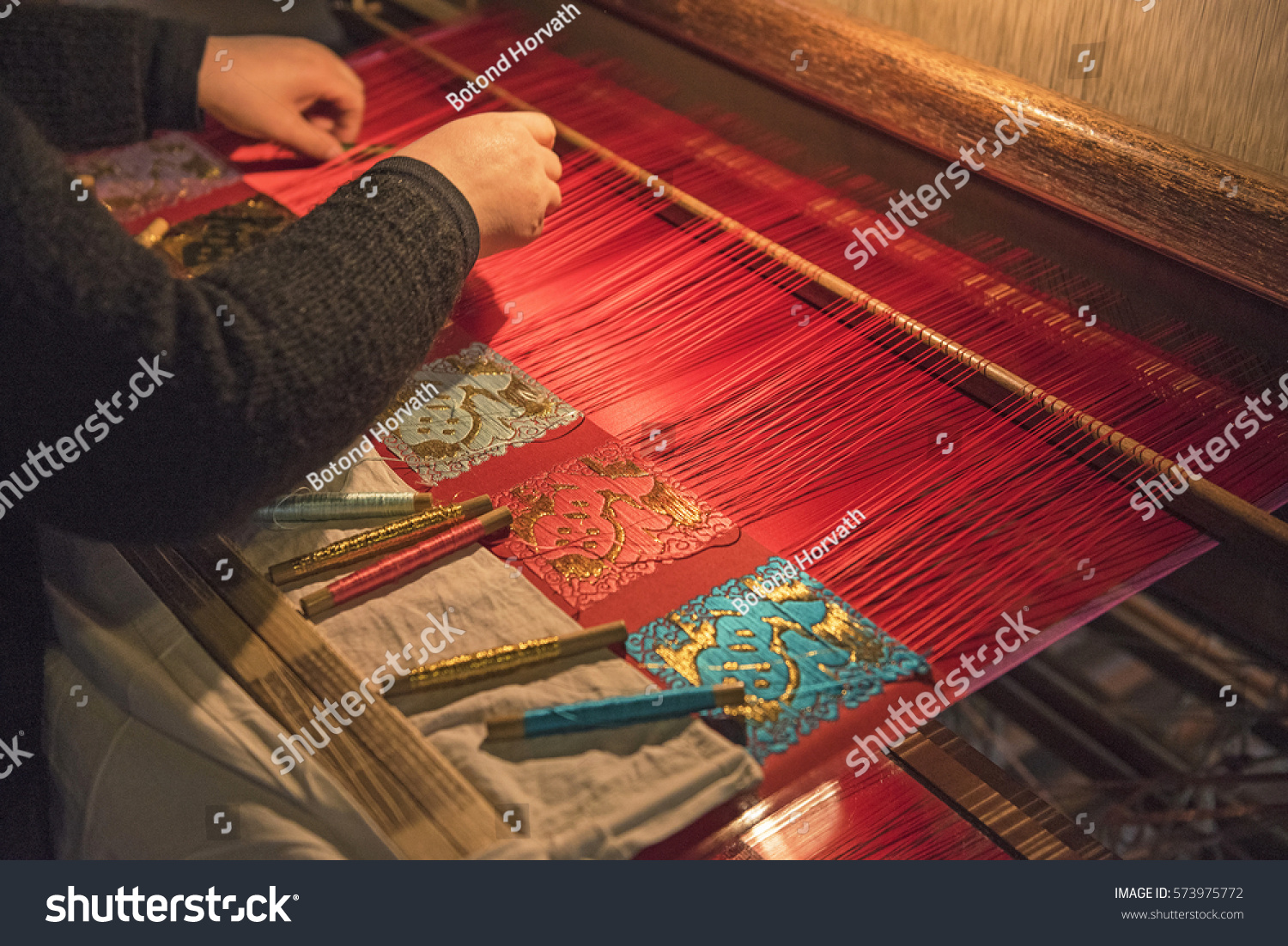 Unidentified women weaving traditional chinese silk in Wuzhen  China
