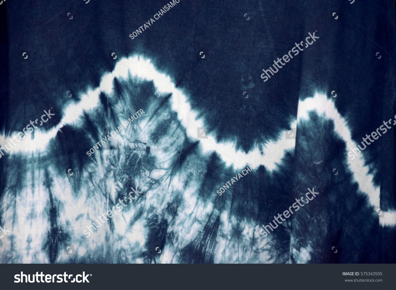 Blurred tie dyed pattern on cotton fabric for background