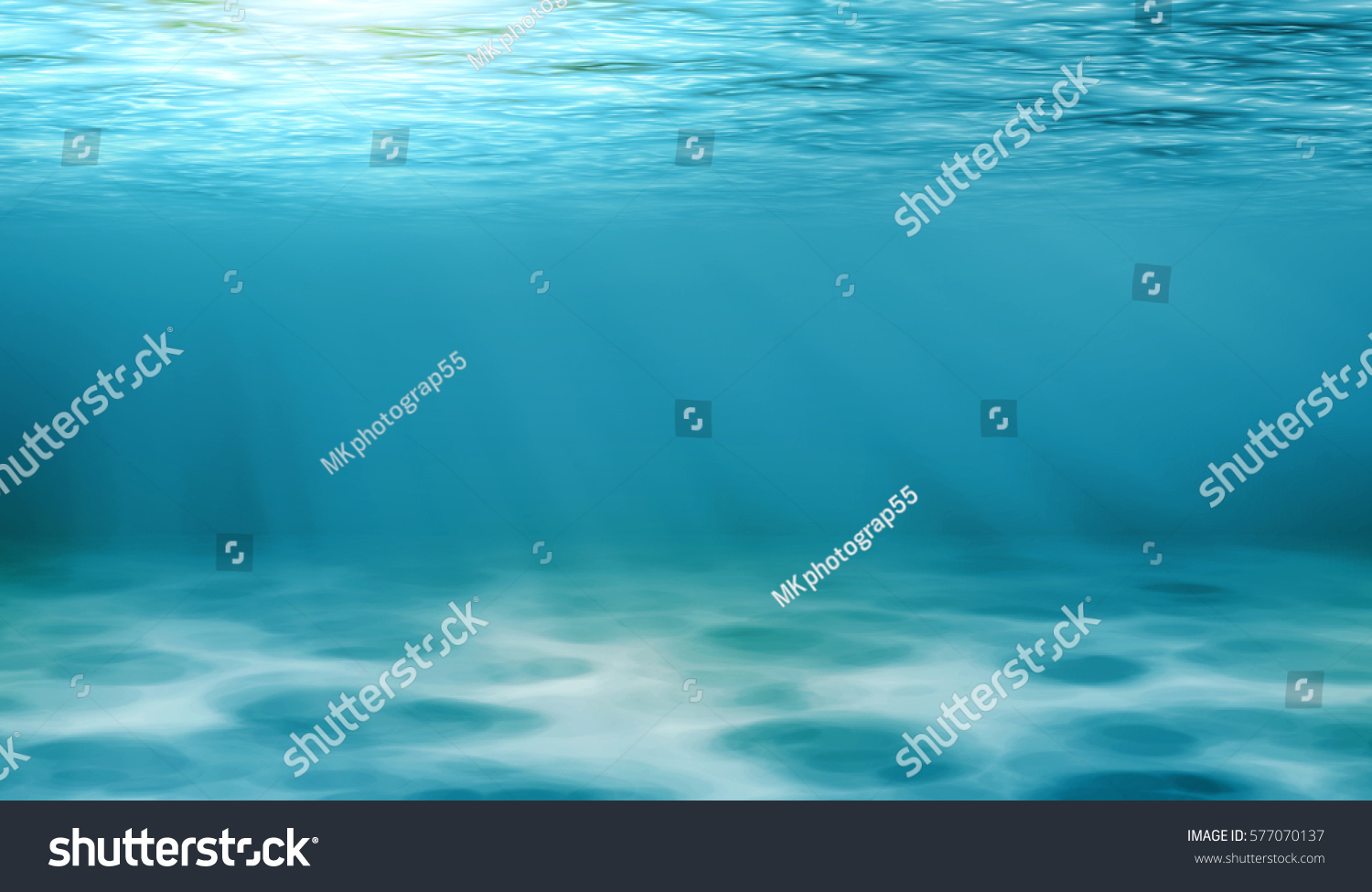 Underwater view of the sea surface or Tranquil underwater scene with copy space.