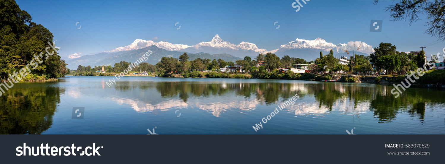 View at Annapurna mountain range and its reflection in Phewa lake in Pokhara  Nepal