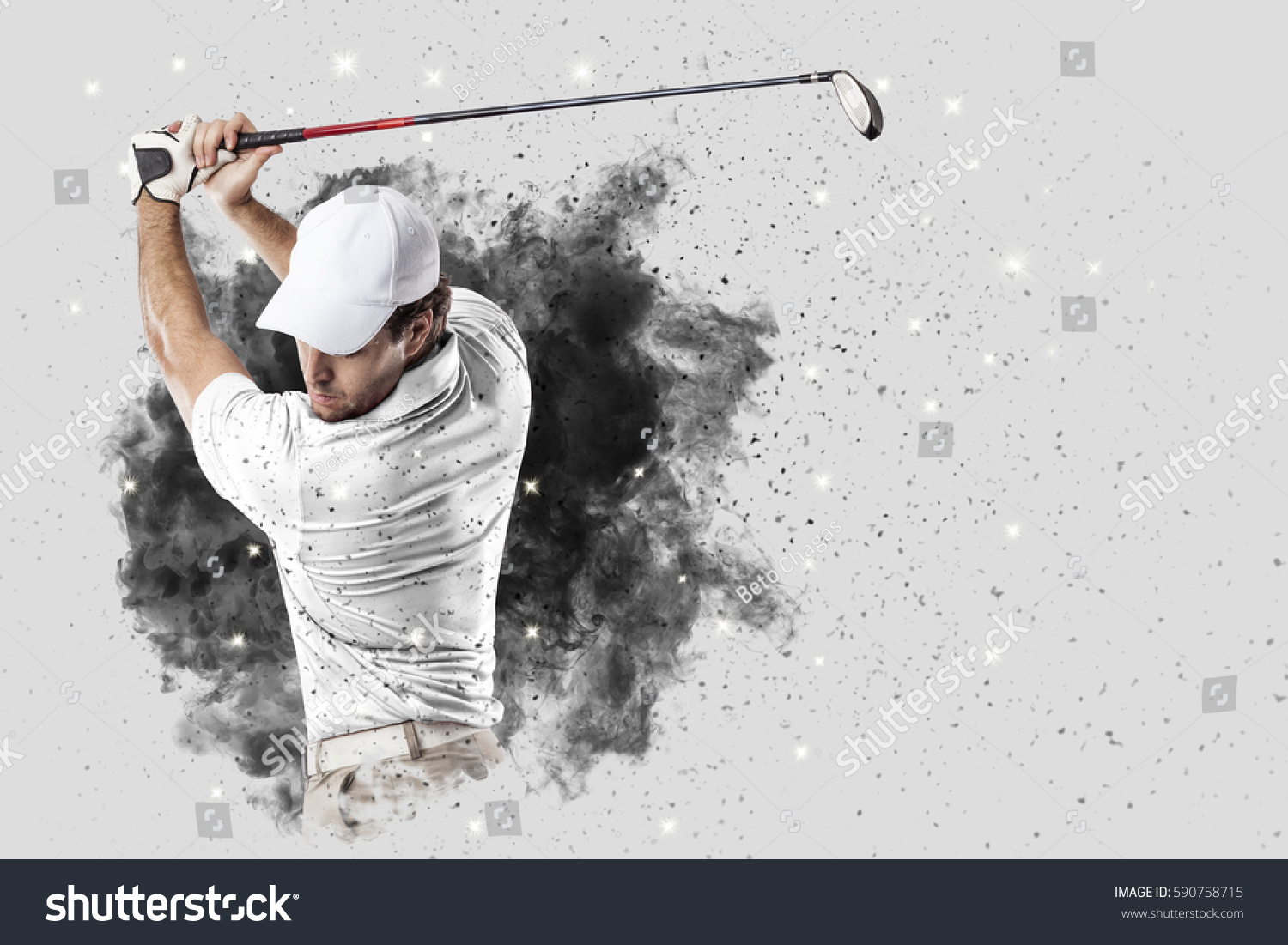 Golf Player with a white uniform coming out of a blast of smoke .