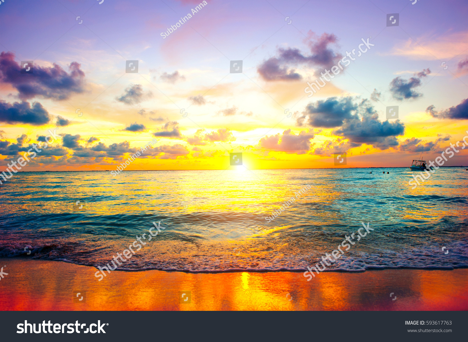 Beautiful Sea Sunset Beach. Paradise Caribbean island. Beauty Scene or sun over colorful sky with clouds. Tourism travel vacation concept background. Mexico. Golden Colors