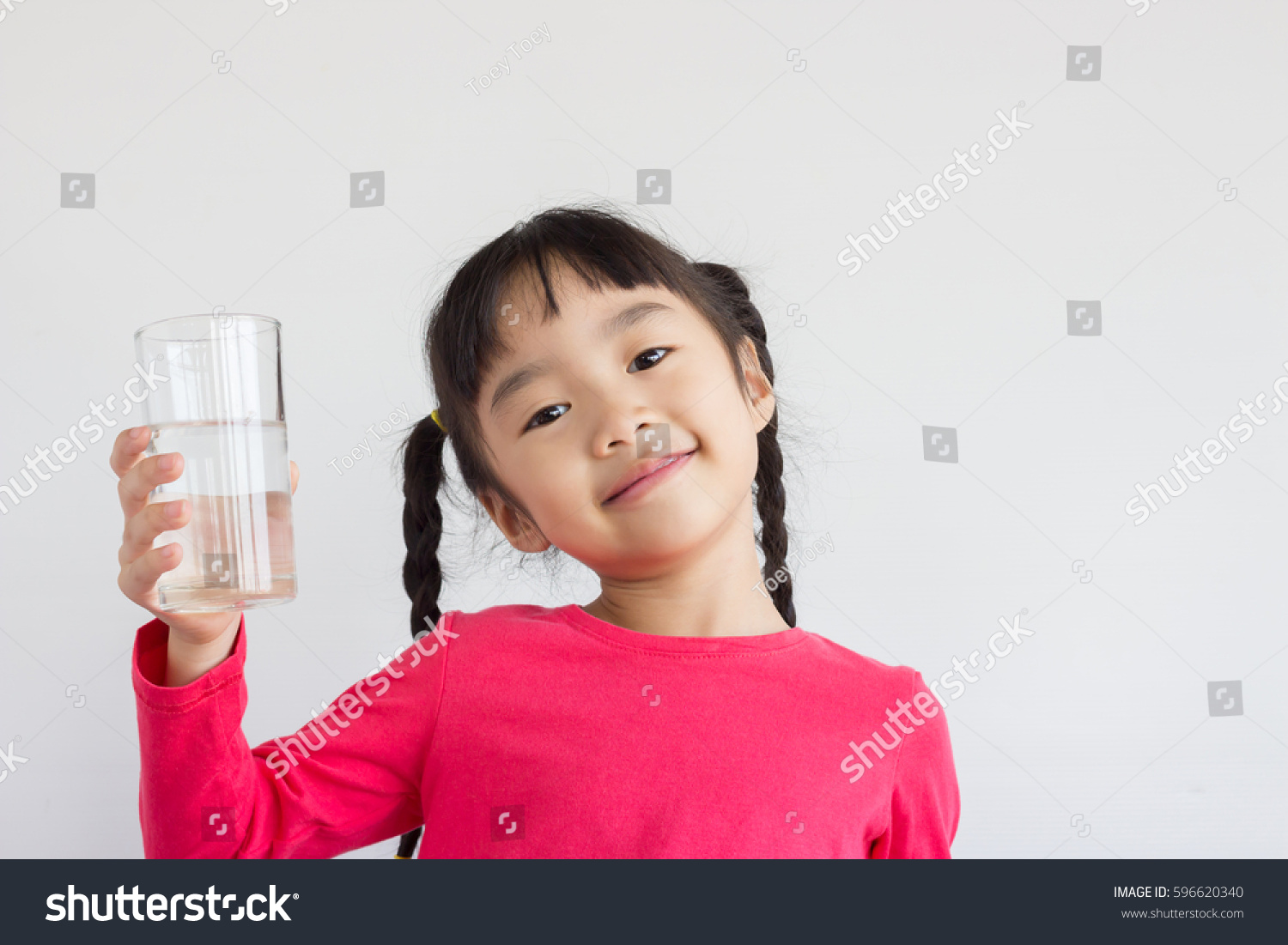 asian child drink water 