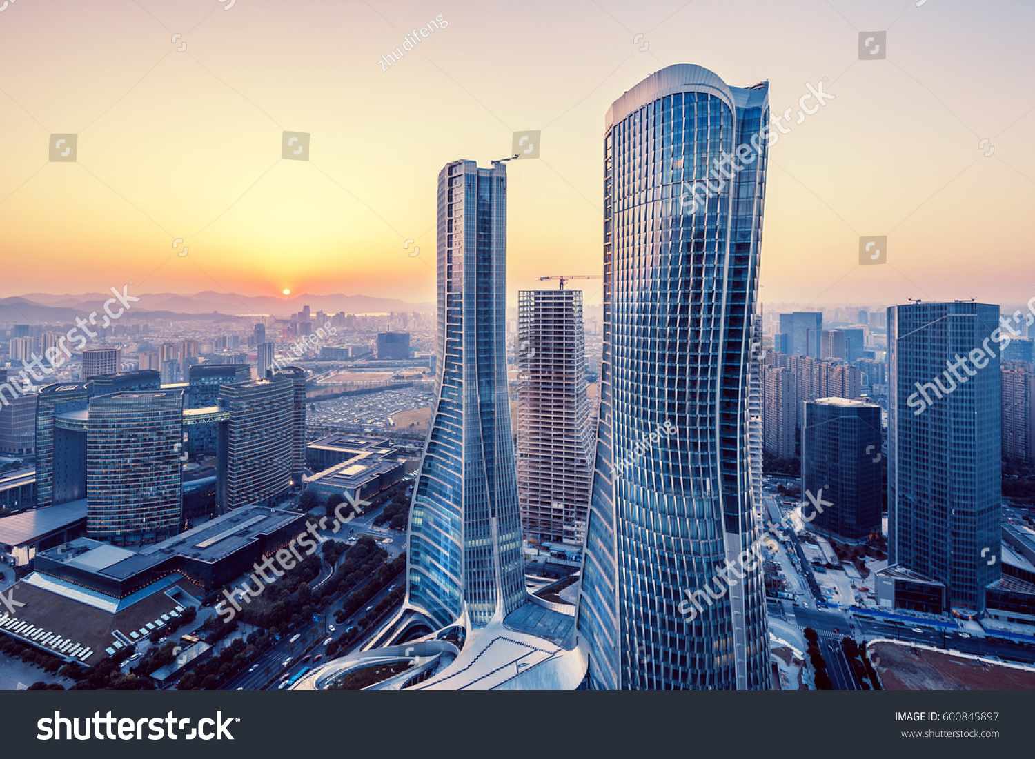 modern buildings in midtown of hangzhou new city at sunrise