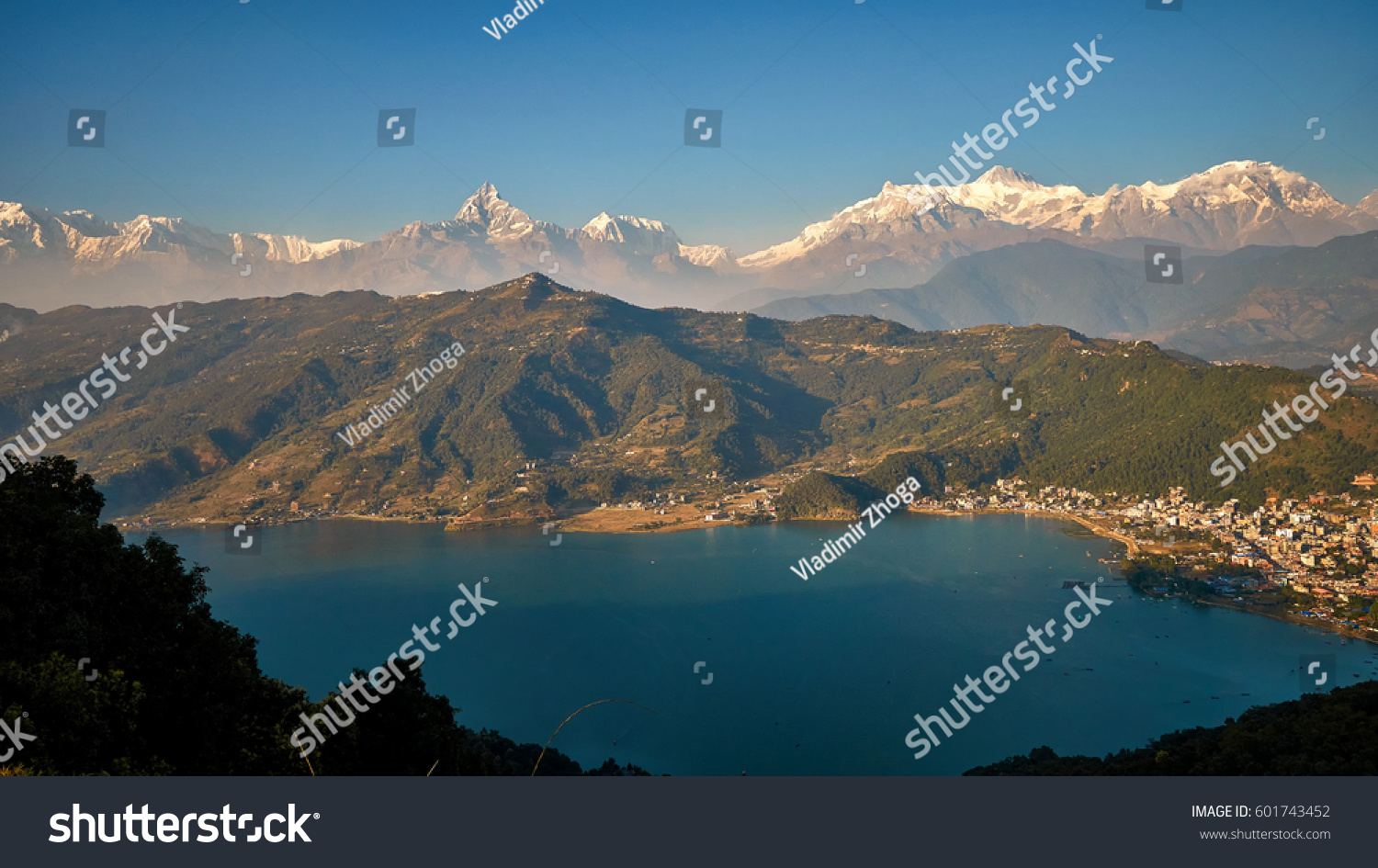 Evening view of Pokhara and Phewa lake with Himalaya mountains at the background from World Peace Pagoda in Pokhara Nepal
