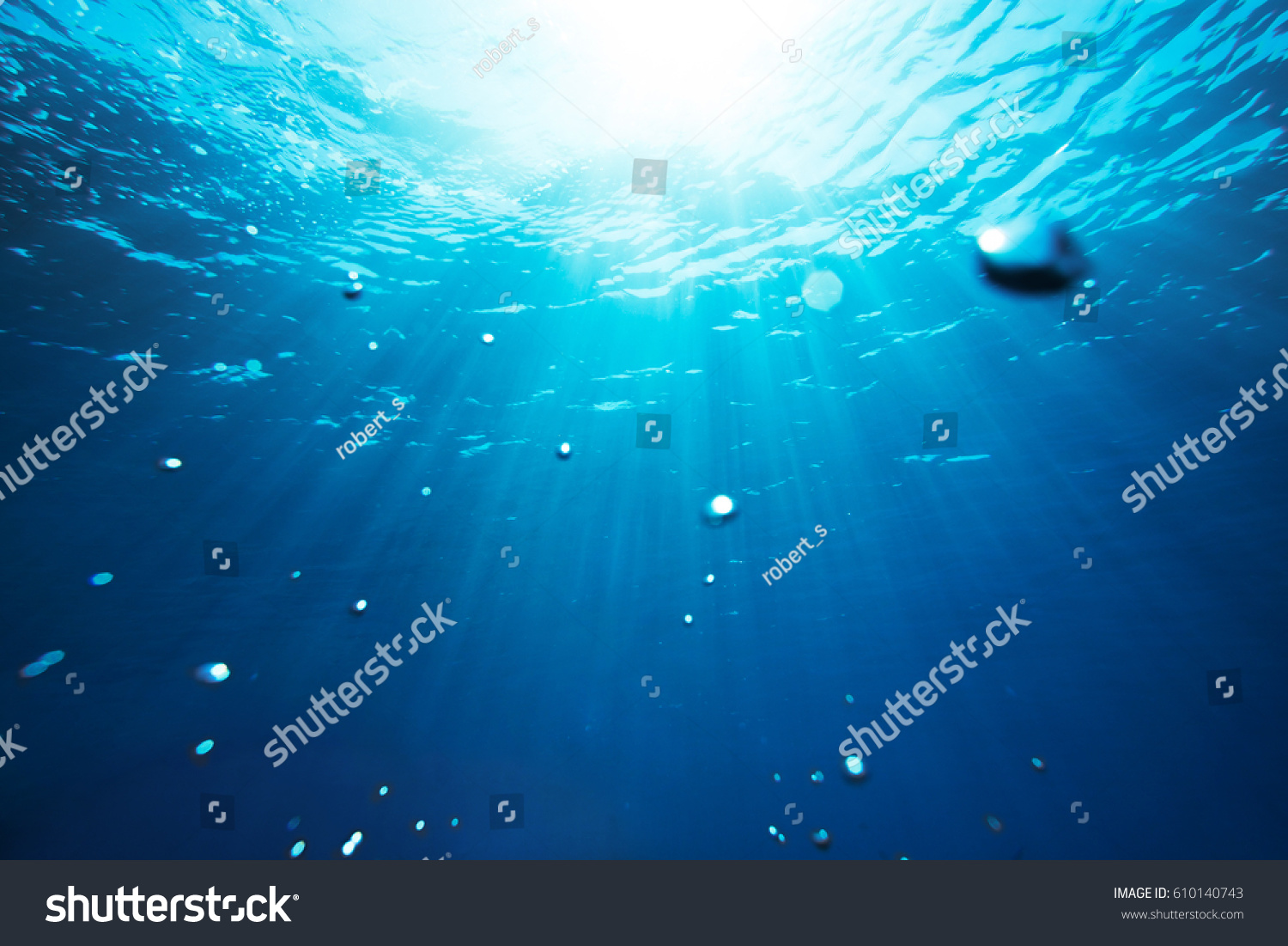 Sea underwater view with sun light. Beauty nature background