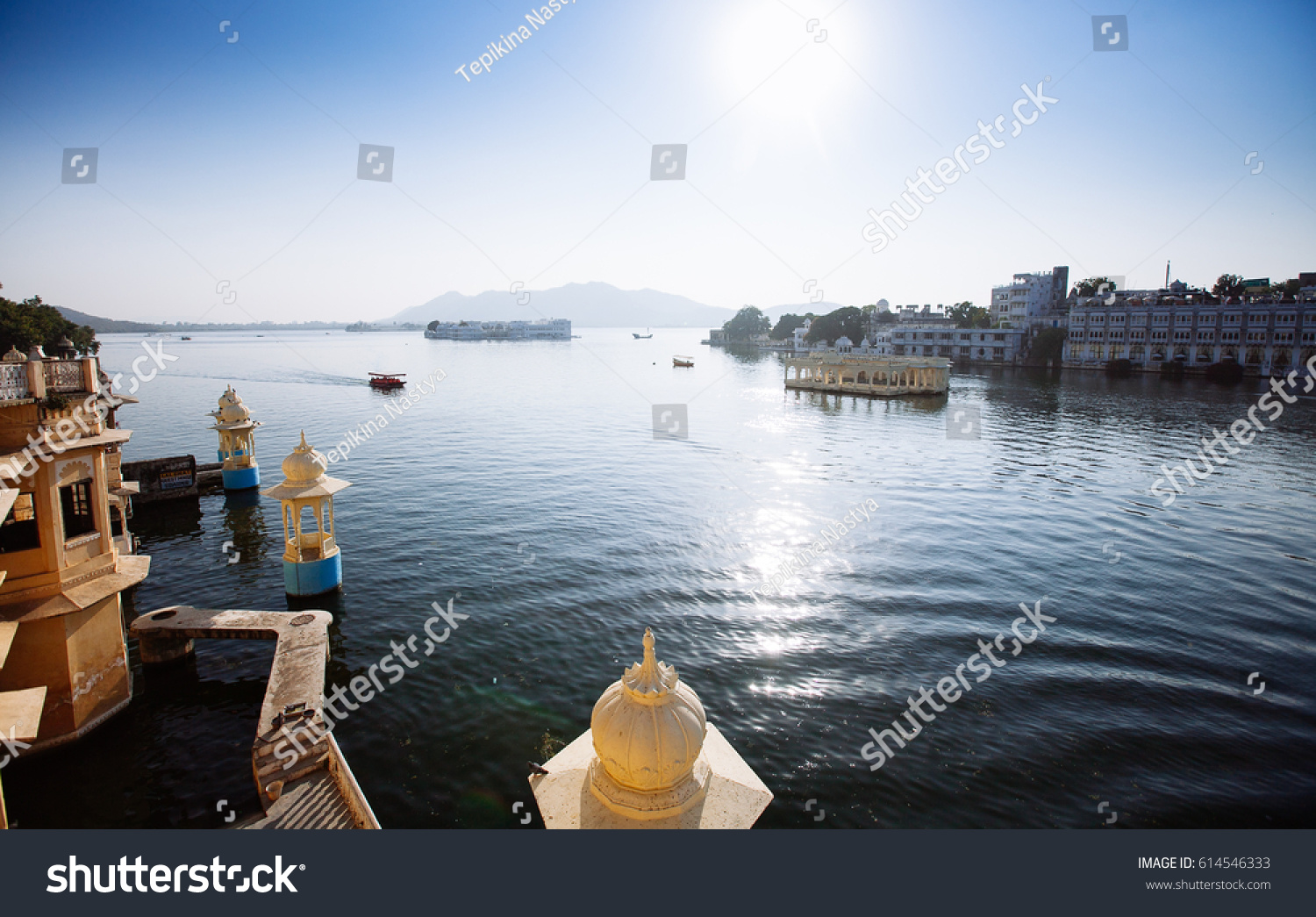 The majestic lake Pichola on sunset travel destination in Rajasthan Udaipur city India