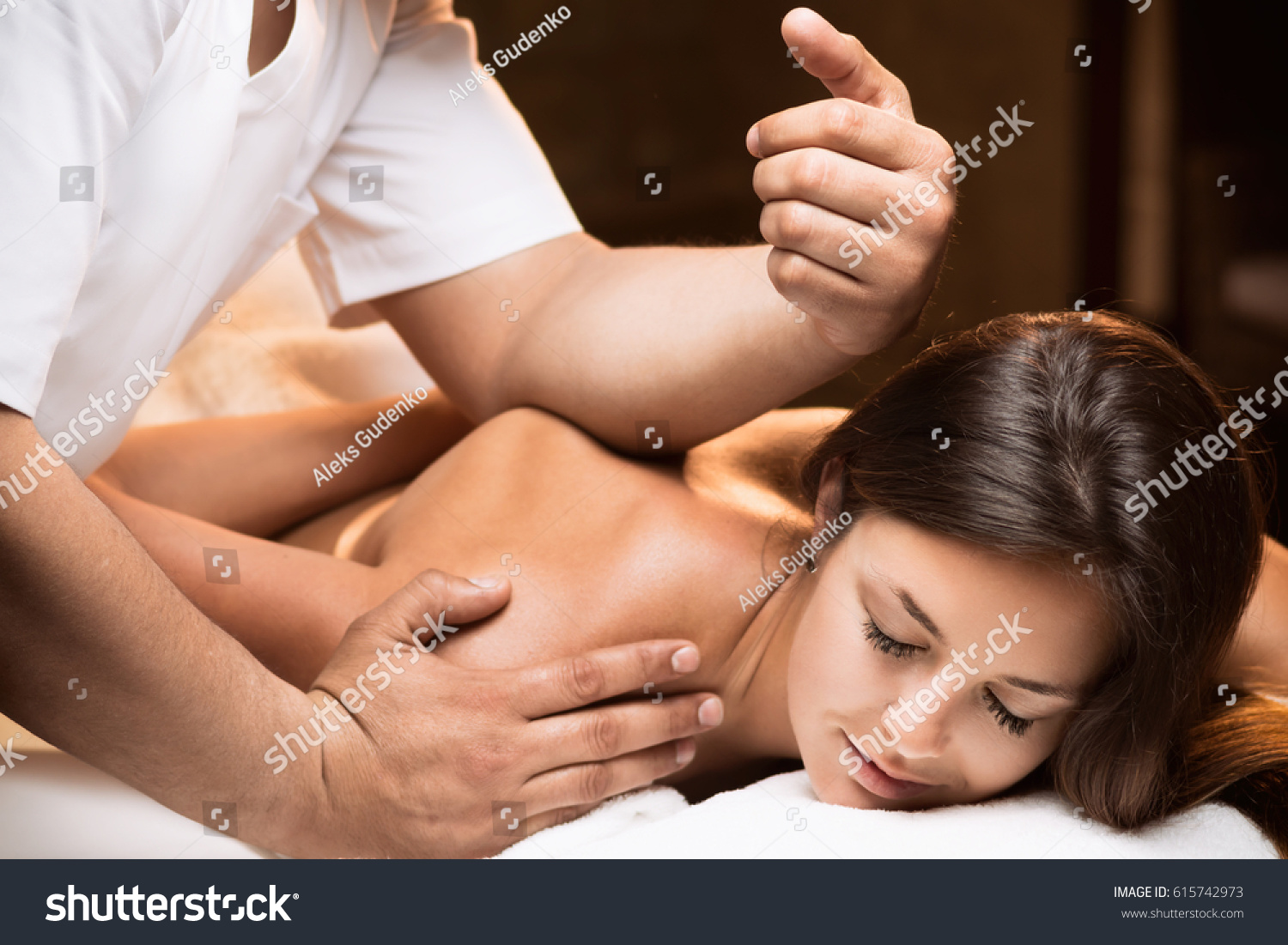The girl enjoys deep tissue massage