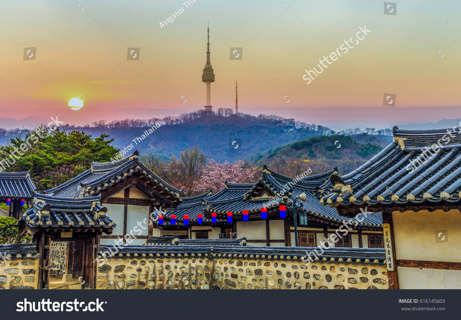 Korean traditional house. Namsangol Hanok Village and Seoul Tower background  Seoul  South Korea.