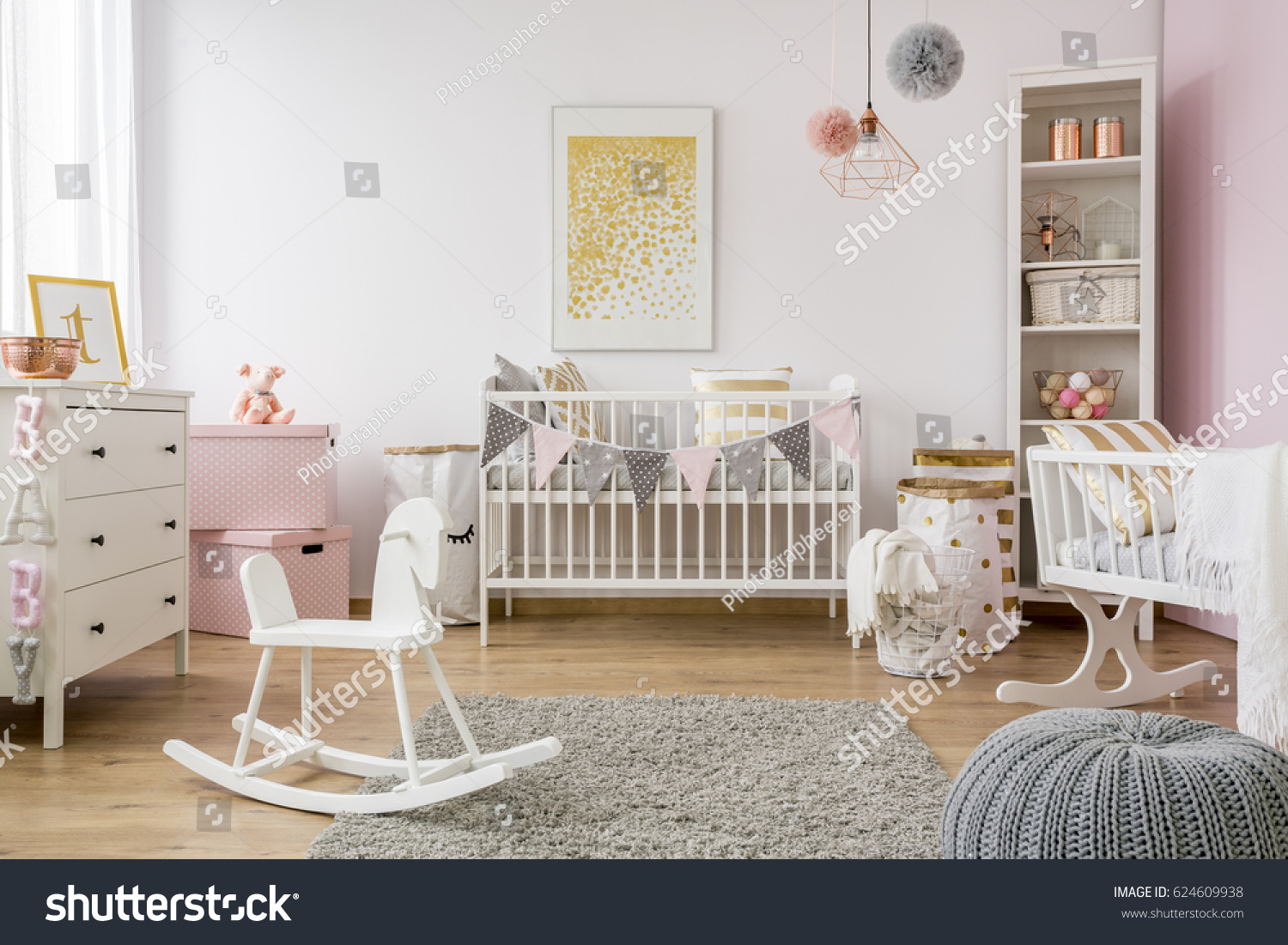 Baby room in scandinavian style with rocking horse  white cot