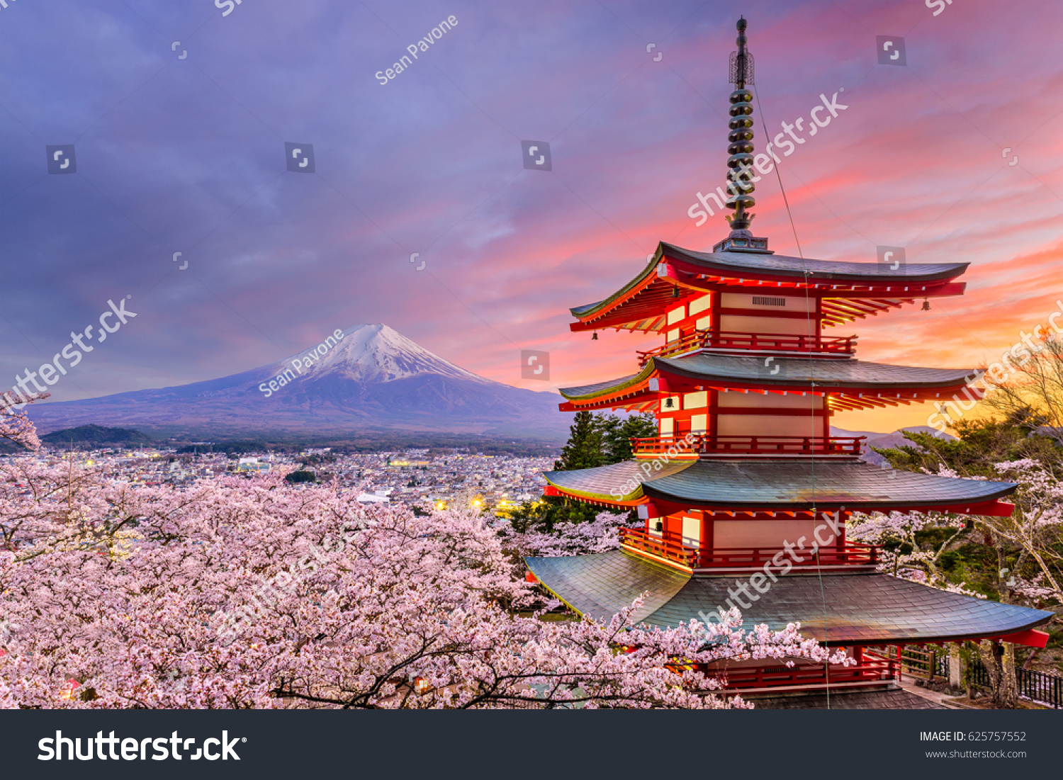 Fujiyoshida  Japan at Chureito Pagoda and Mt. Fuji in the spring with cherry blossoms.
