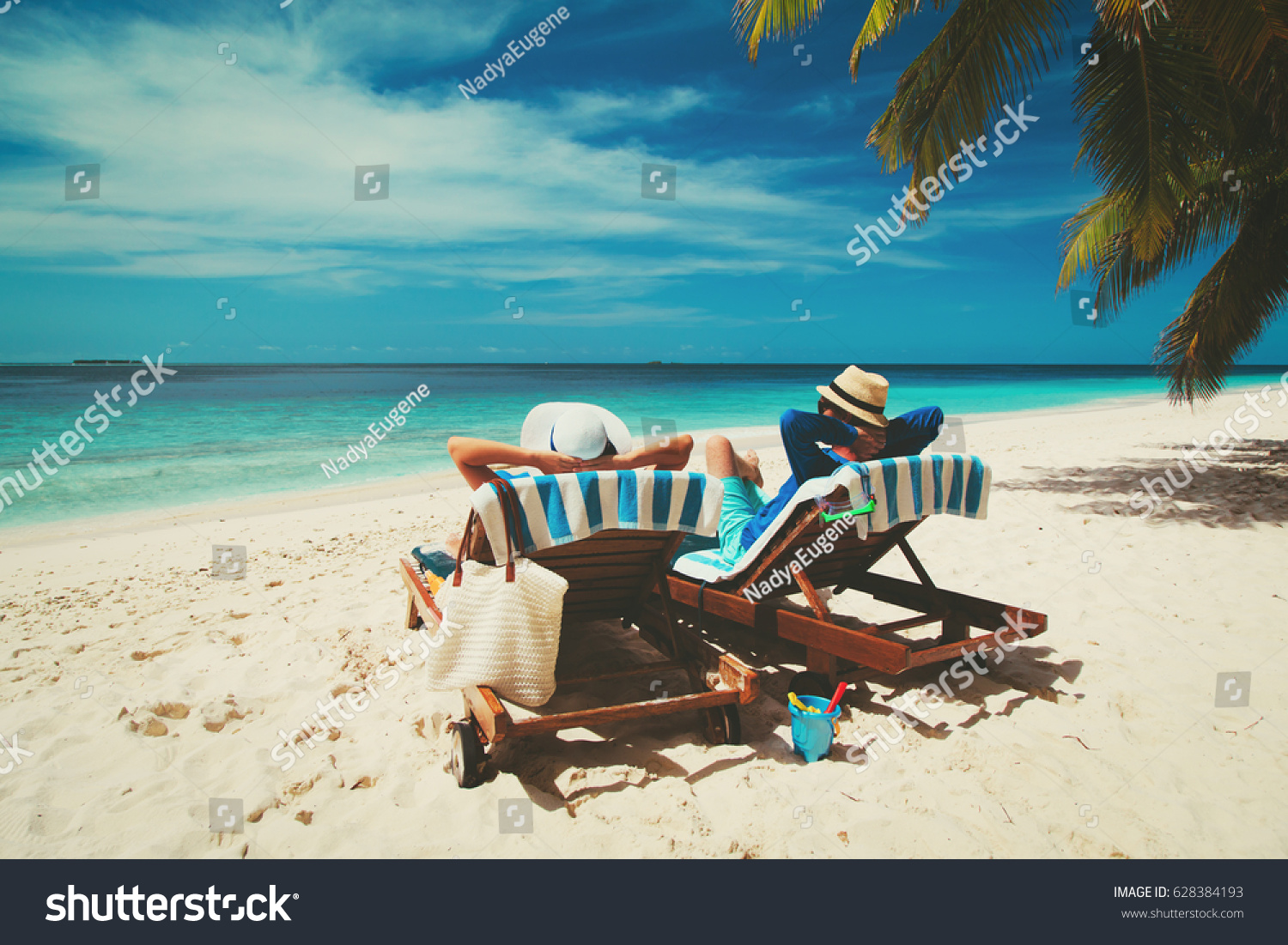 happy couple relax on a tropical beach