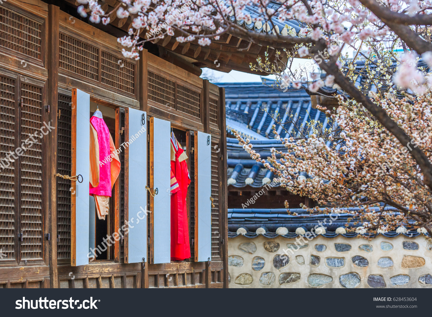 Korean traditional house. Namsangol Hanok Village and Seoul Tower background  Seoul  South Korea.