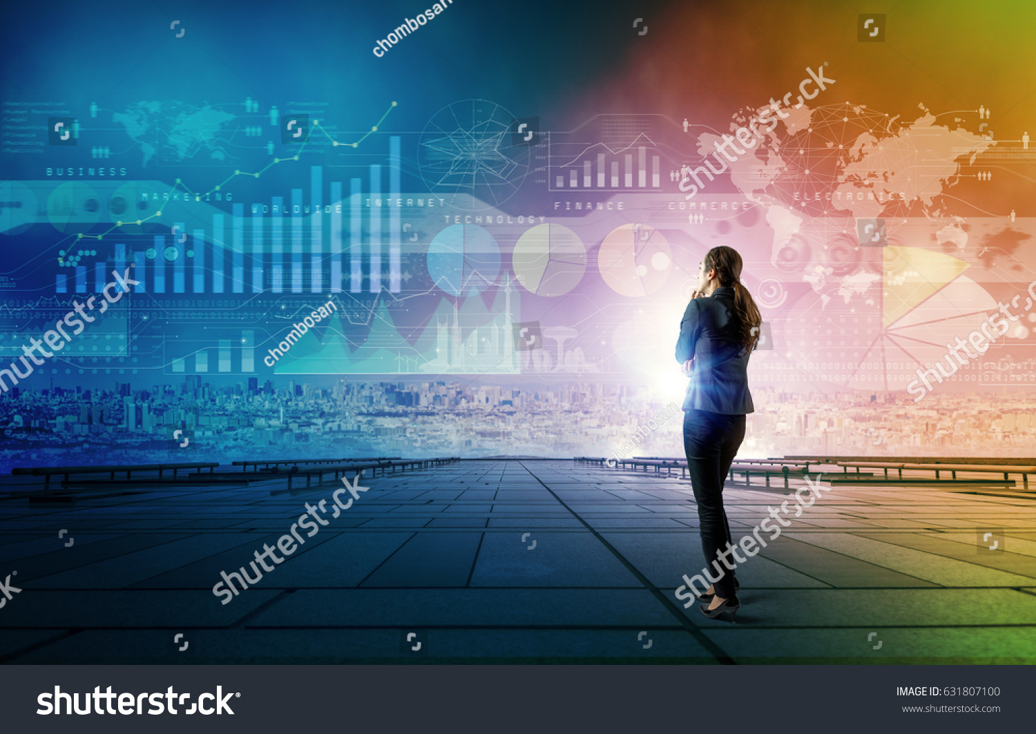 standing woman who looks various graphics of business. Internet of Things. Information Communication Technology. Digital transformation. Abstract mixed media.