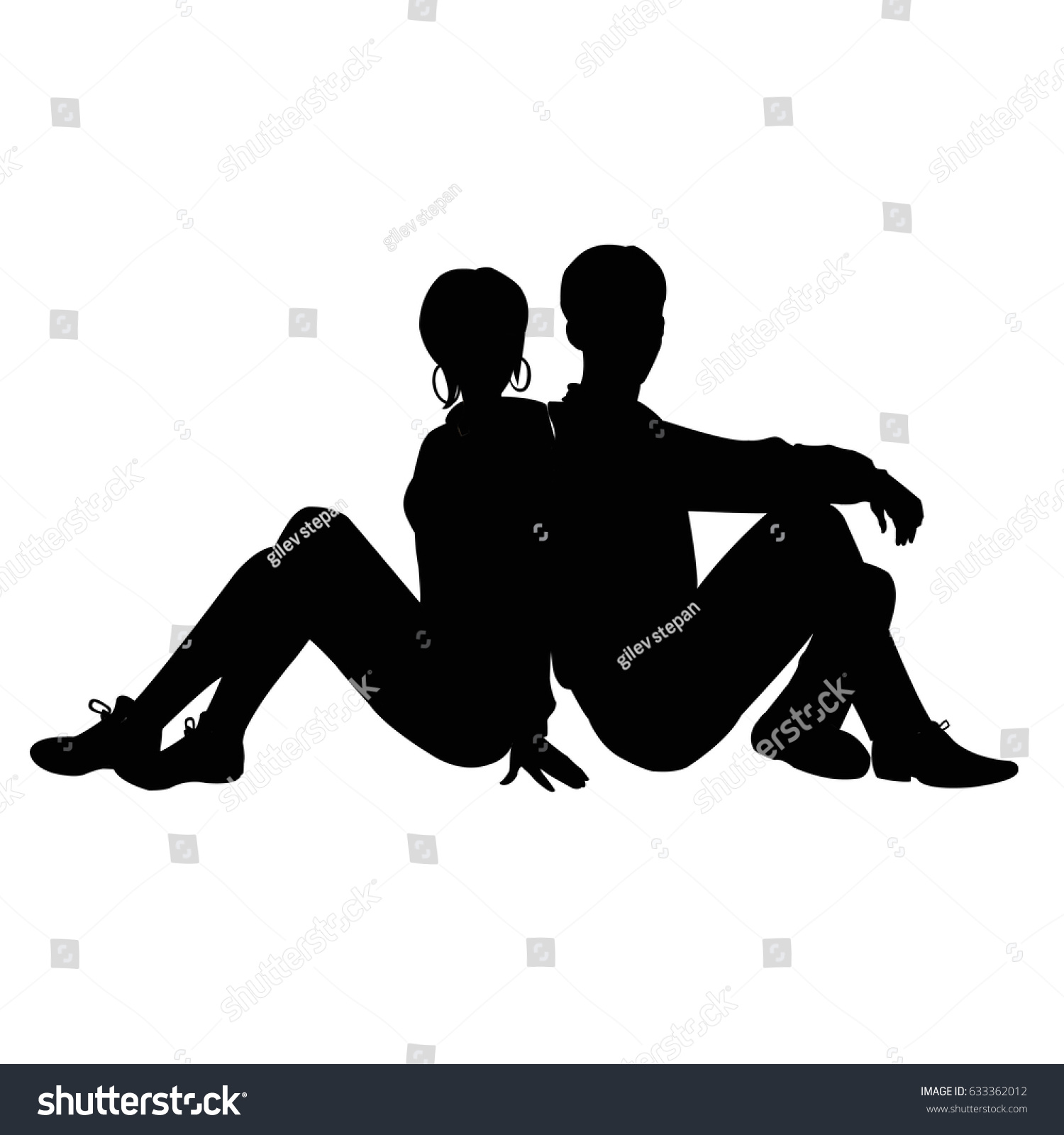 Silhouette of a guy and a girl sitting back to back