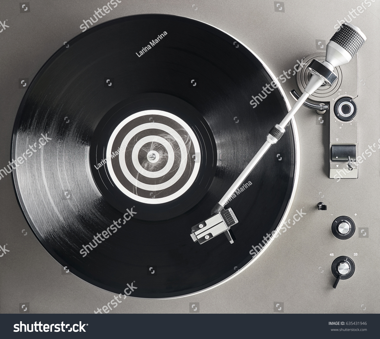 Turntable vinyl record player. Retro audio equipment for disc jockey. Sound technology for DJ to mix & play music. Black vinyl record