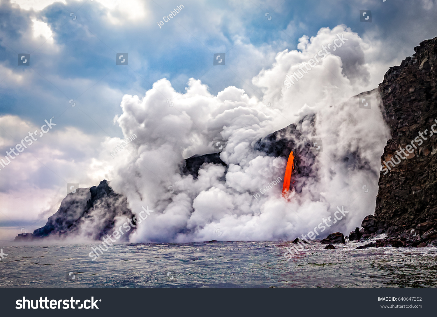 Wide shot of the Kamokuna ocean entry in Hawaii's Volcano National Park