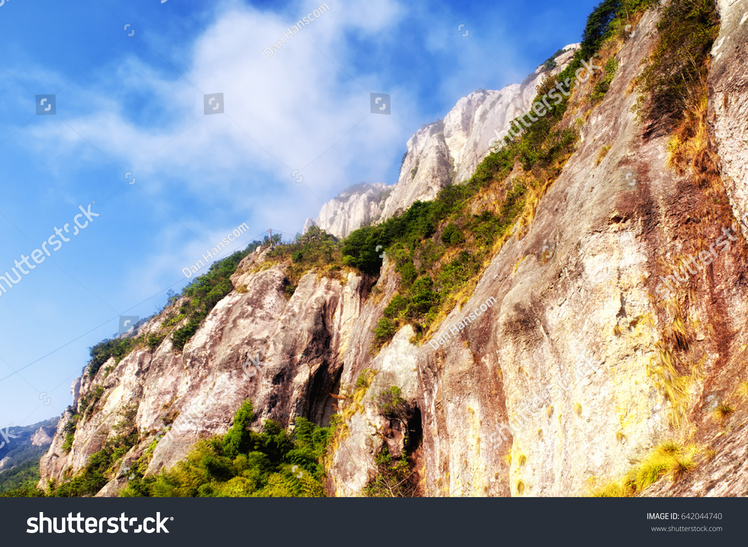 Early morning clouds hanging over Yandangshan or Yandang mountains in China in Zhejiang province.