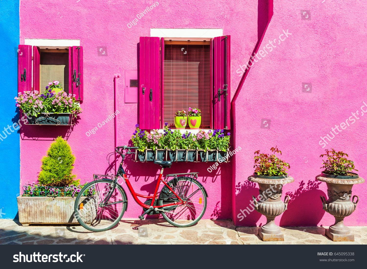 House with pink wall. Colorful houses in Burano island near Venice  Italy