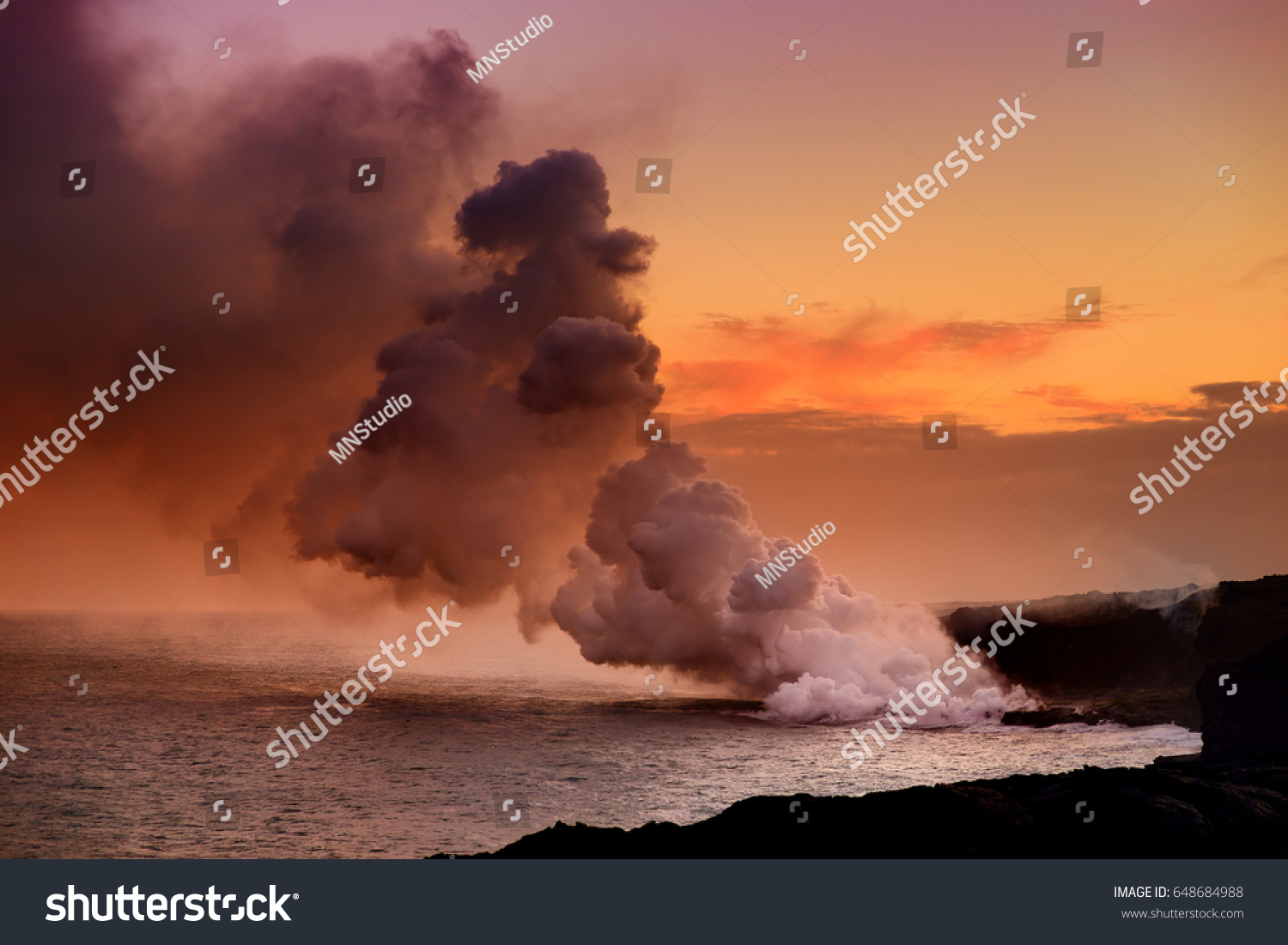 Lava pouring into the ocean creating a huge poisonous plume of smoke at Hawaii's Kilauea Volcano  Volcanoes National Park  Big Island of Hawaii