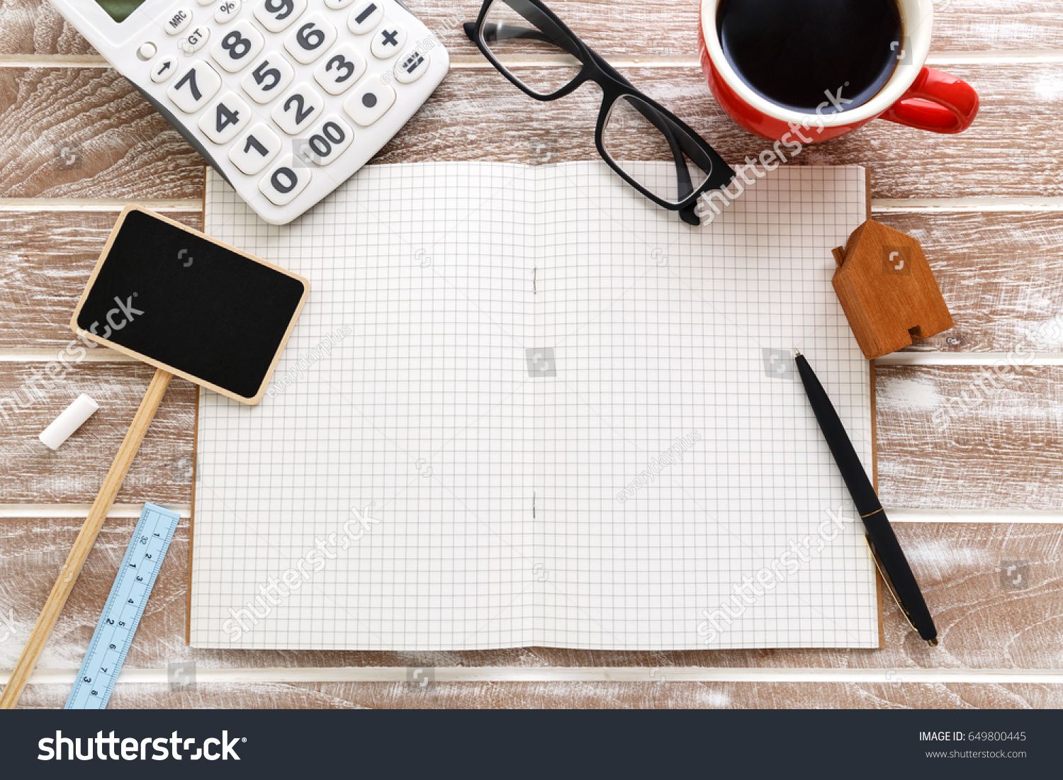 for sale sign and calculator for property taxes and mortgage