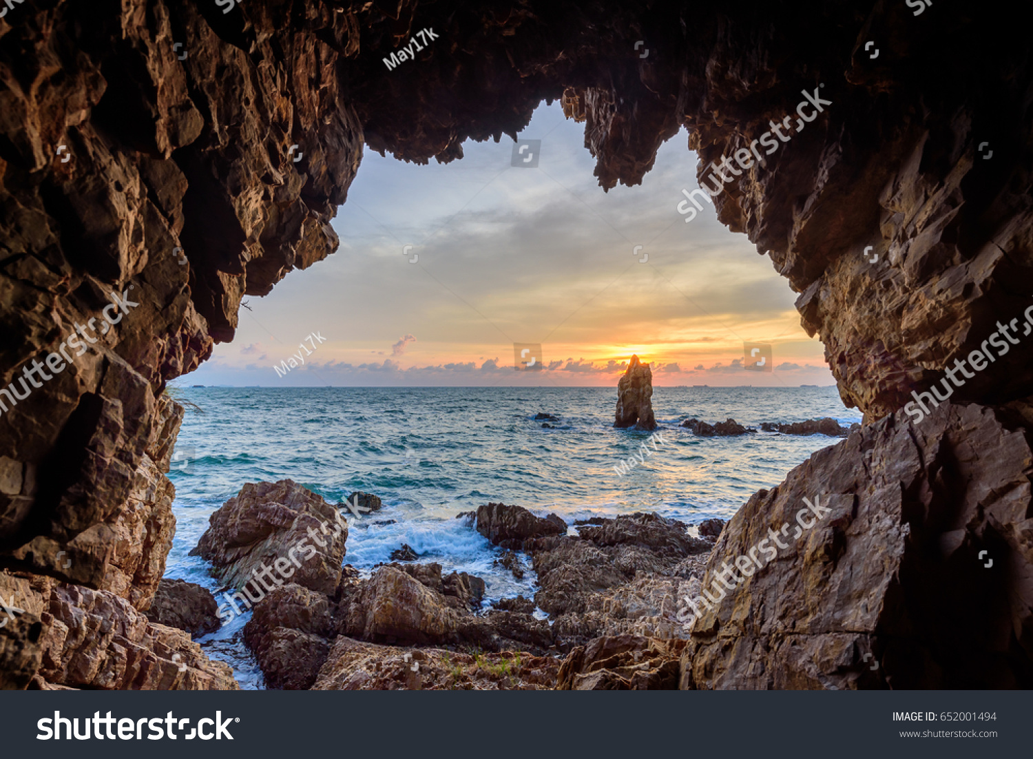 The cave with beautiful sunset view of the sea