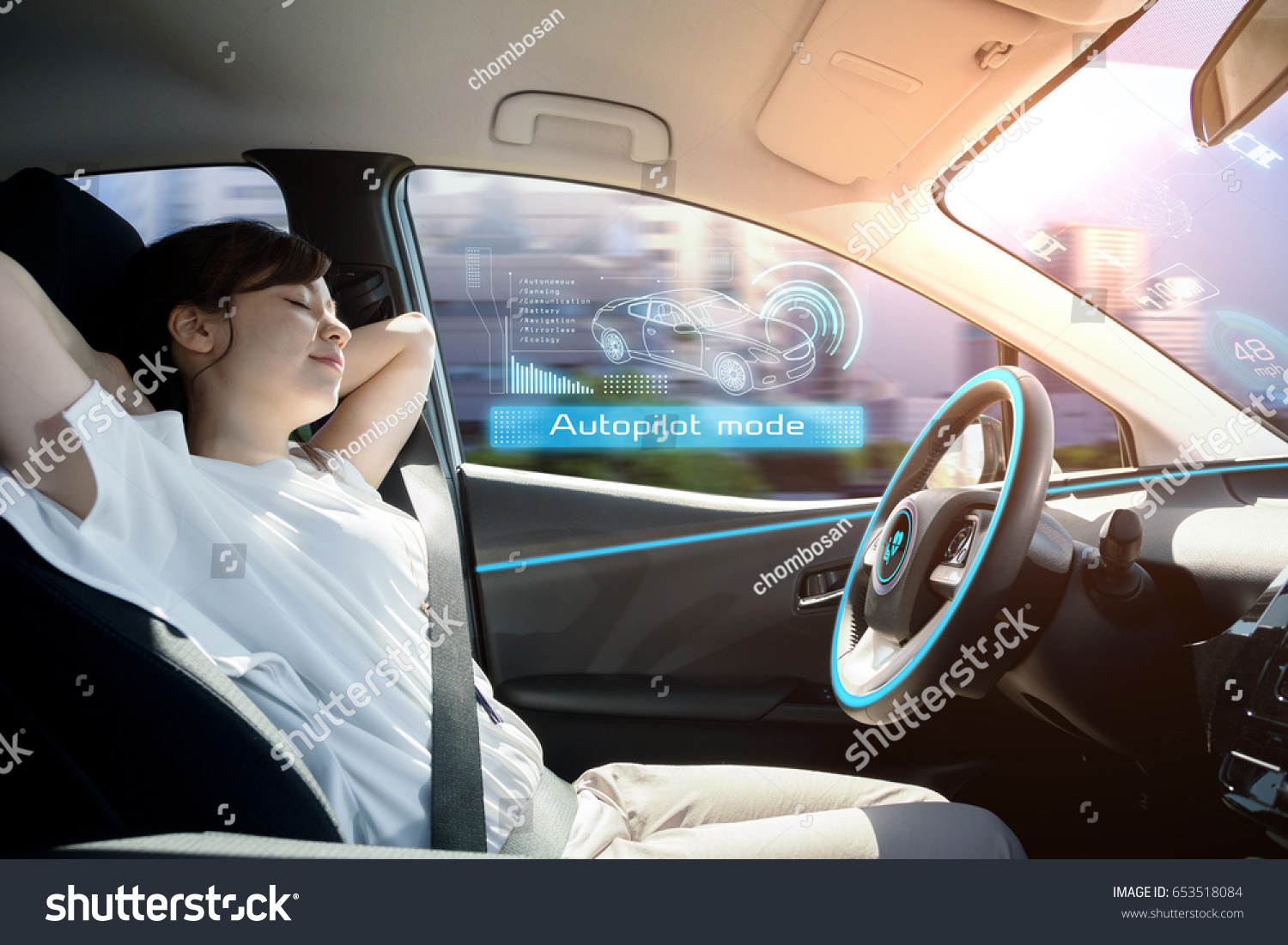 sleeping woman in autonomous car. self driving vehicle. autopilot. automotive technology.
