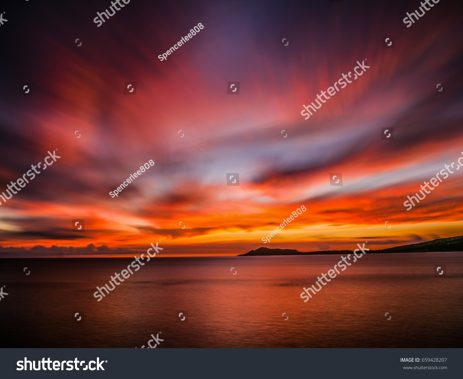 A long exposure of an amazing sunset from China Walls on Oahu