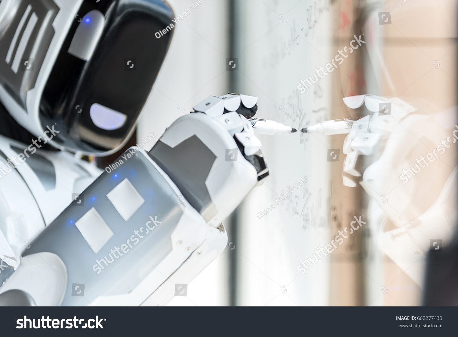 Smart robot is standing against transparent board