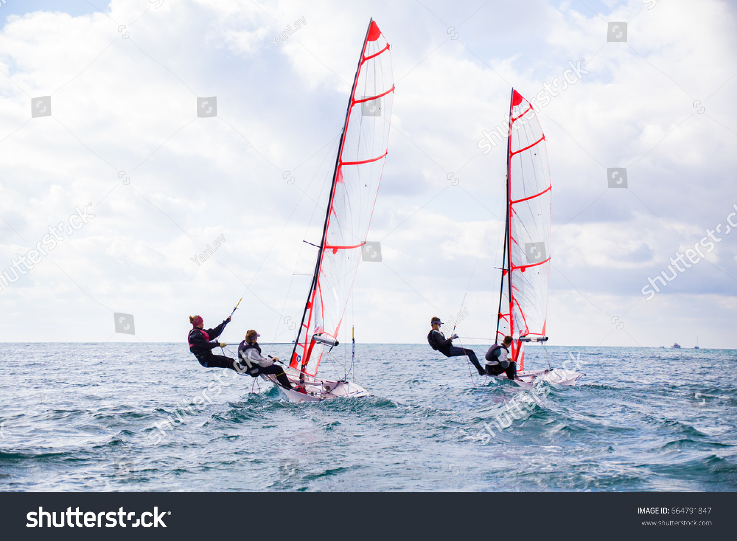 Regatta of sailing yachts on the sea on a windy day
