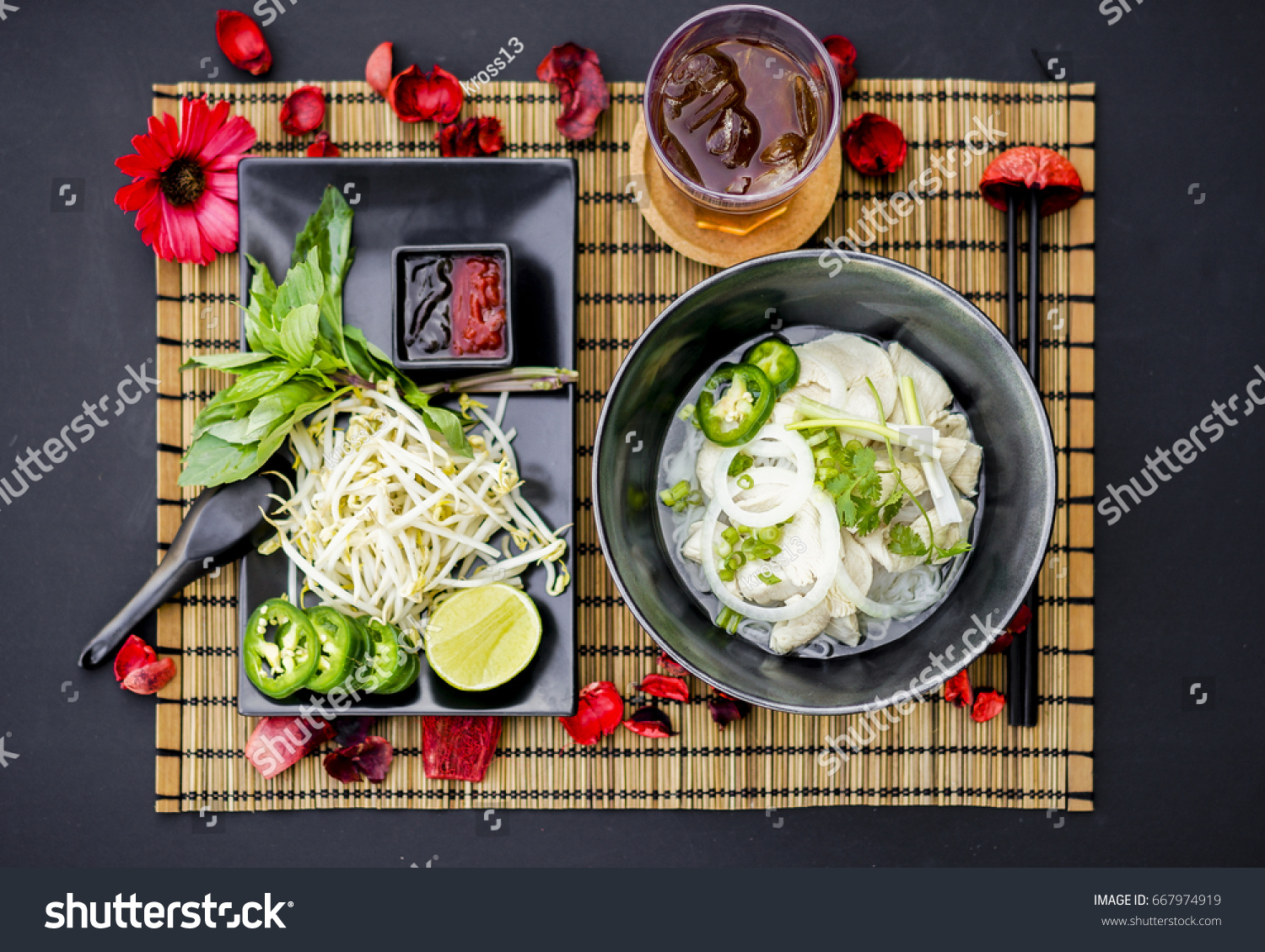 Chicken pho is a famous Vietnamese traditional food in which rice vermicelli served with well done chicken and hot tasty soup and fresh vegetable.